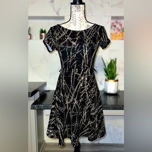 SMALL gently used, skater dress with side loops for a belt of your choice.